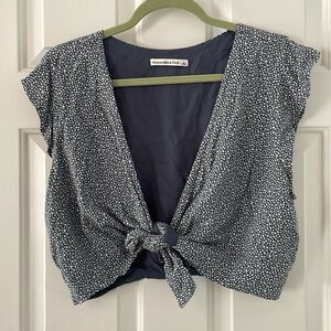 Abercrombie Blue & White Dot Crop top with tie in front.  Large